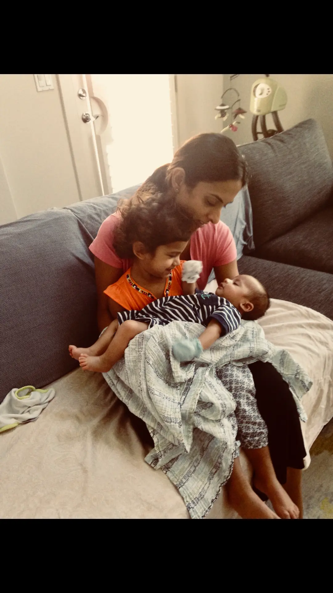 A moment from Nora's years of doula work with families